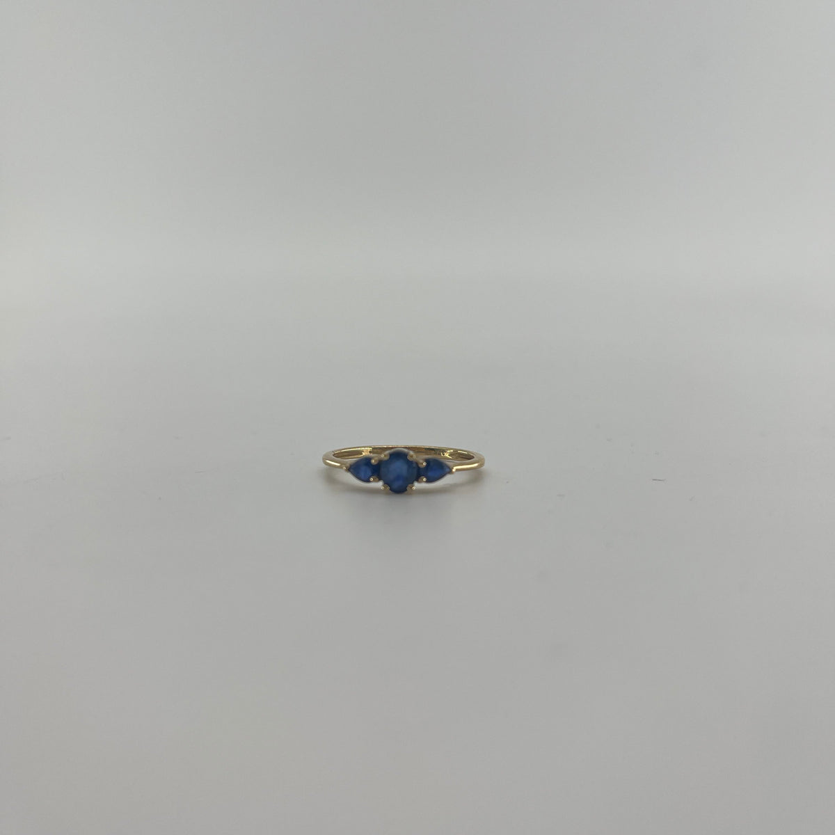 9ct Three Stone Sapphire Ring Carat: 9ct Gold Colour: Yellow Gold Size: Q Stones: Sapphire Weight: 1.6g