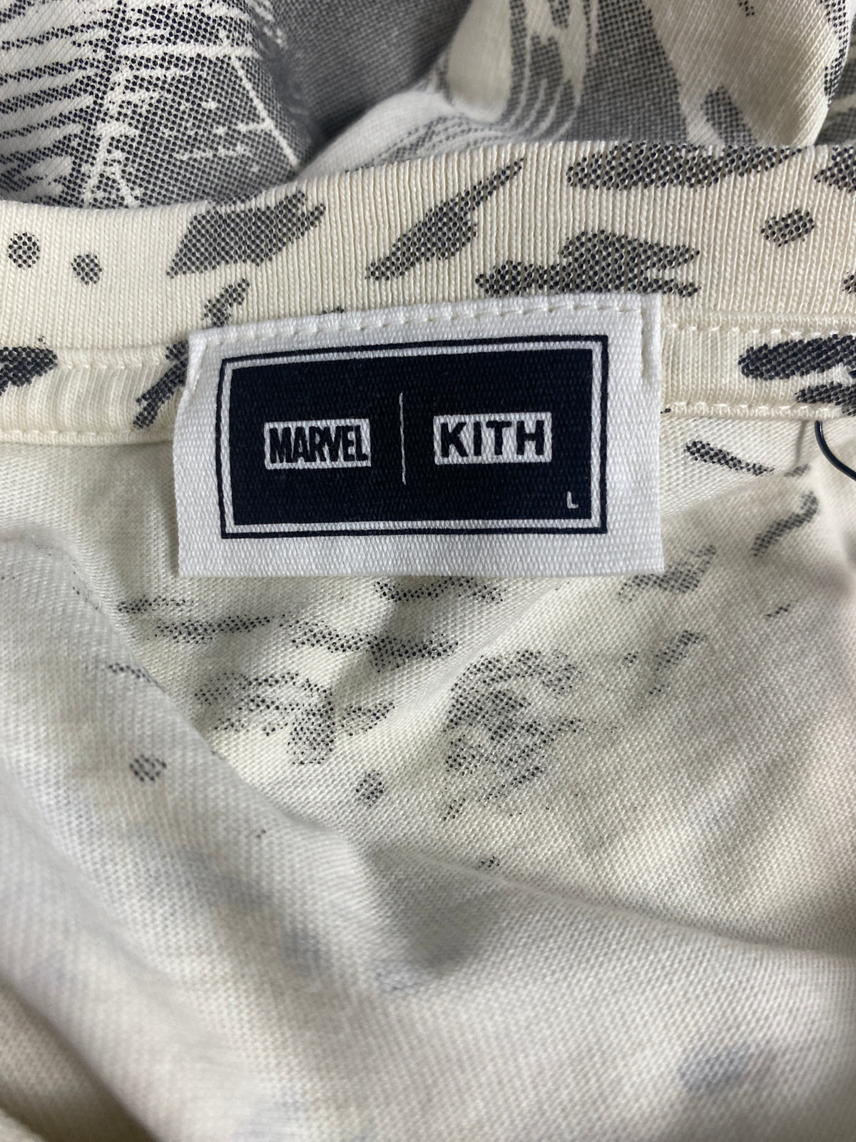 Kith x Marvel Spider-Man AOP Vintage Jones Tee Sandrift