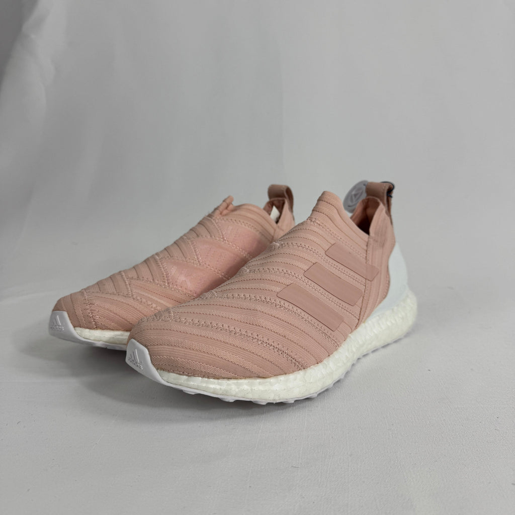 The Adidas Nemeziz Tango 17 Ultra Boost Kith Flamingo is a limited-edition sneaker that blends football-inspired design with