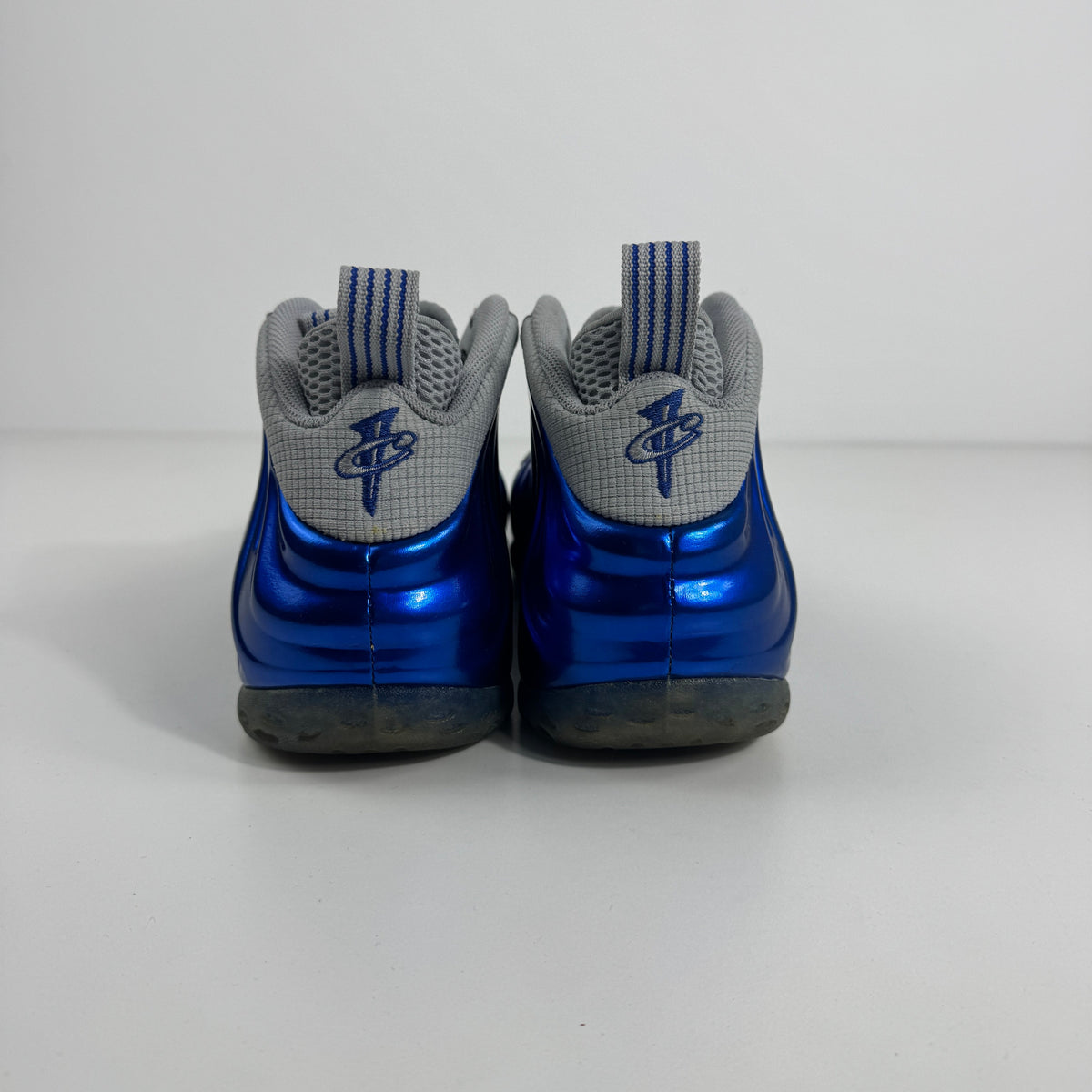 Air Foamposite One is a bold, futuristic sneaker known for its molded Foamposite upper, exceptional durability, and