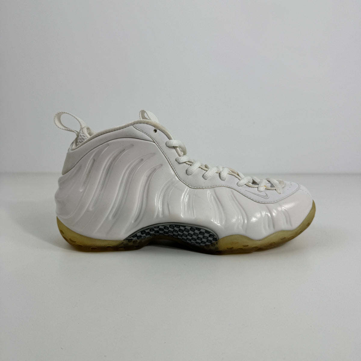 Nike Air Foamposite One is a standout basketball sneaker known for its futuristic molded Foamposite upper, durable
