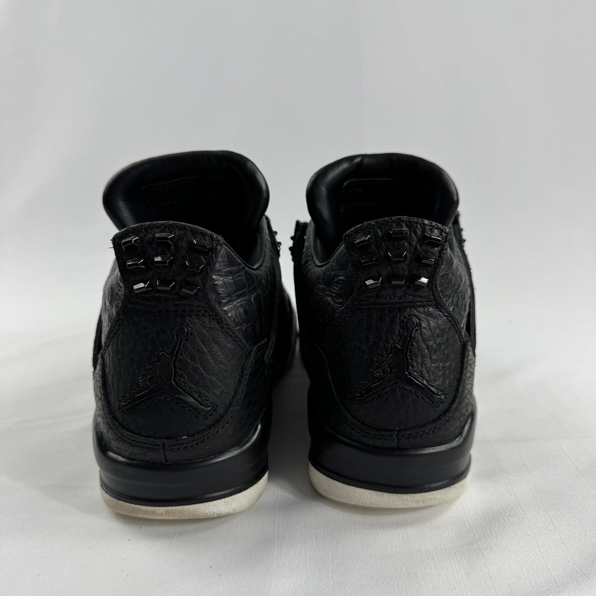 The Air Jordan 4 Retro Premium is a luxury reinterpretation of the classic Air Jordan 4 silhouette, focusing on high-end