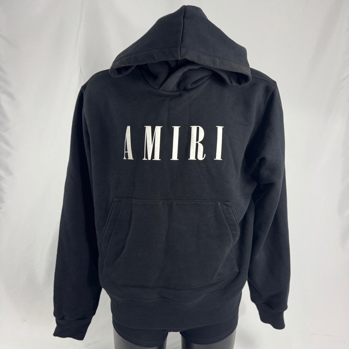 Amiri Black Logo Hoodie crafted from premium cotton, featuring the signature Amiri logo, ribbed trims, and a relaxed fit for