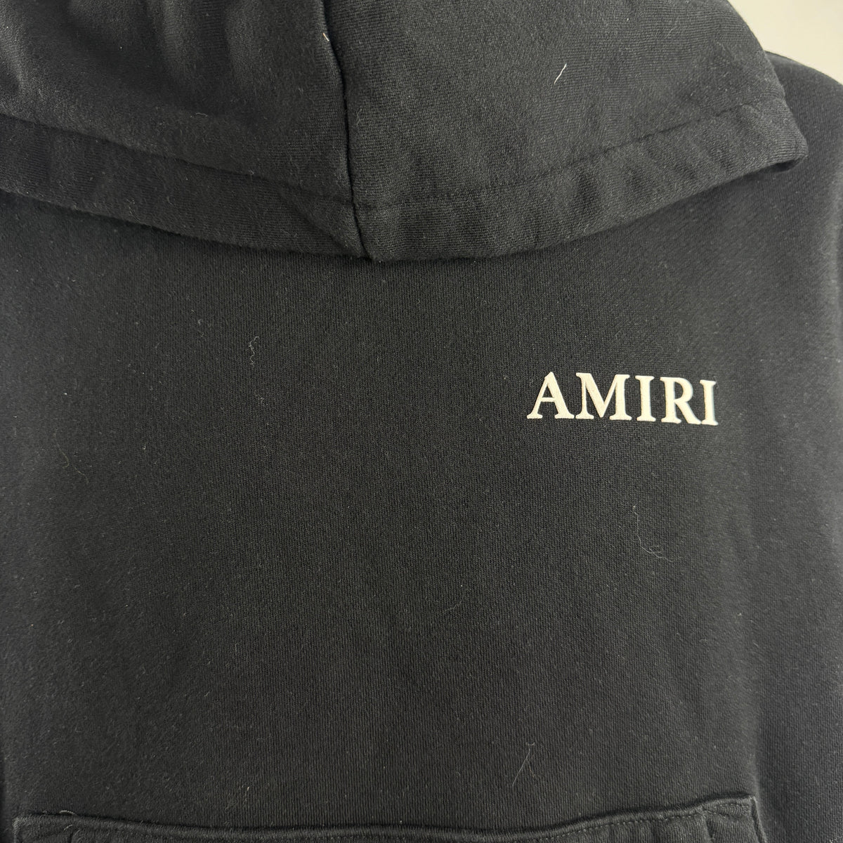 Amiri Bones Stacked Hoodie crafted from premium cotton, featuring the iconic Bones graphic, adjustable drawstring hood,