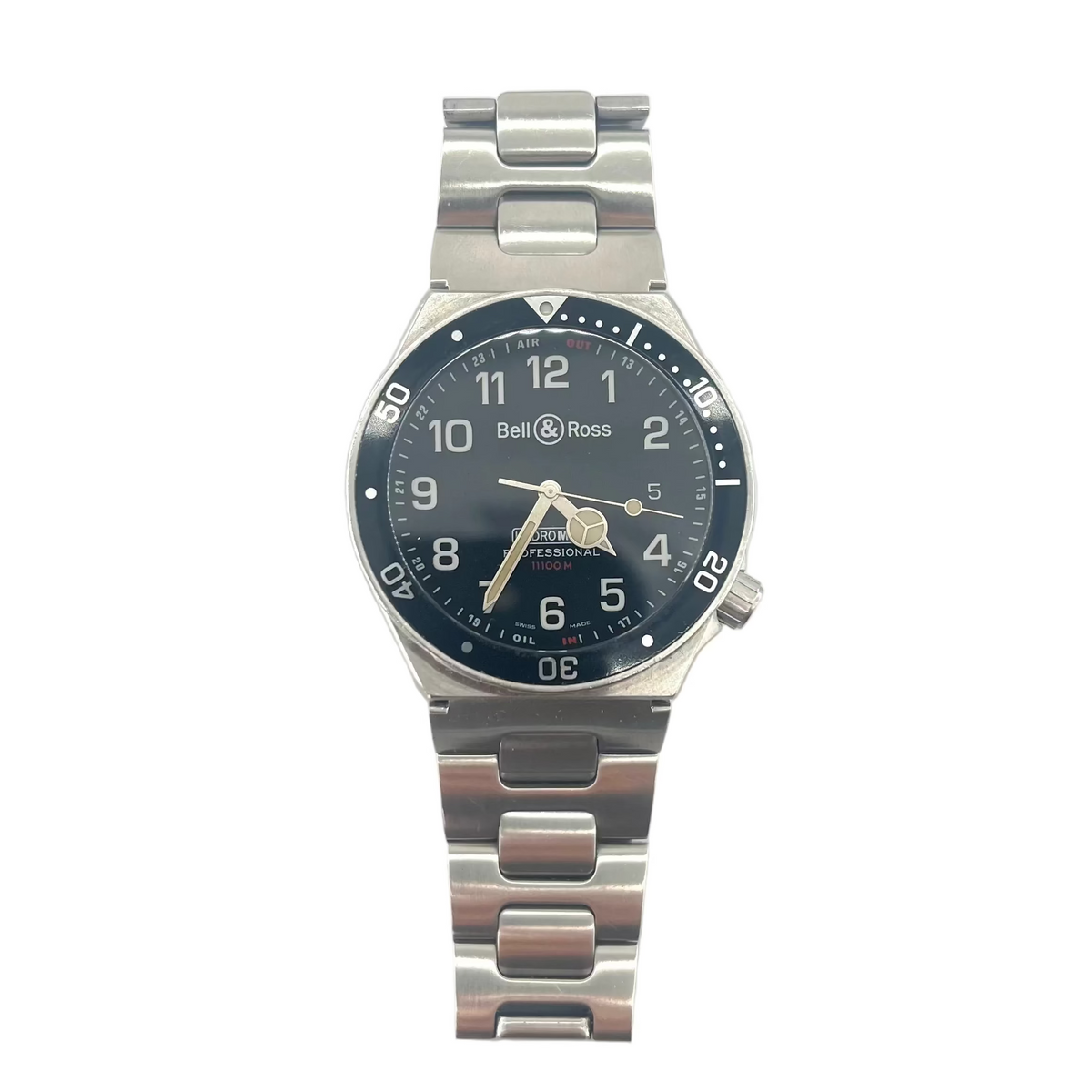 Bell and Ross watch with a metal band, black bezel and face, silver hands, white numerals on a white background with extra straps.