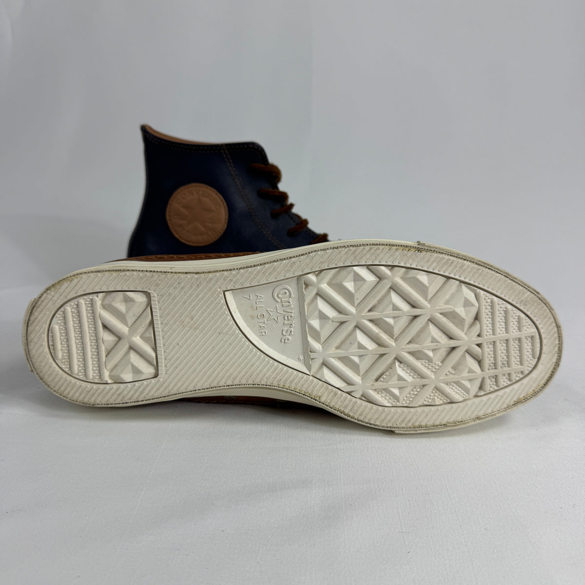 The Converse Chuck Taylor All Star Premium is an elevated version of the iconic sneaker, featuring high-quality materials,