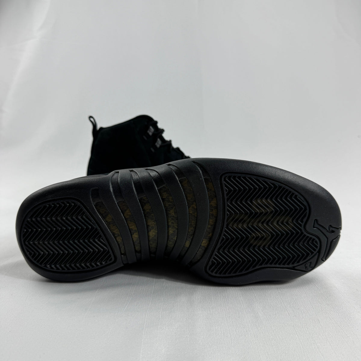 The Jordan 12 Retro “OVO Black” is a premium collaboration between Jordan Brand and Drake’s OVO label. Released in extremely