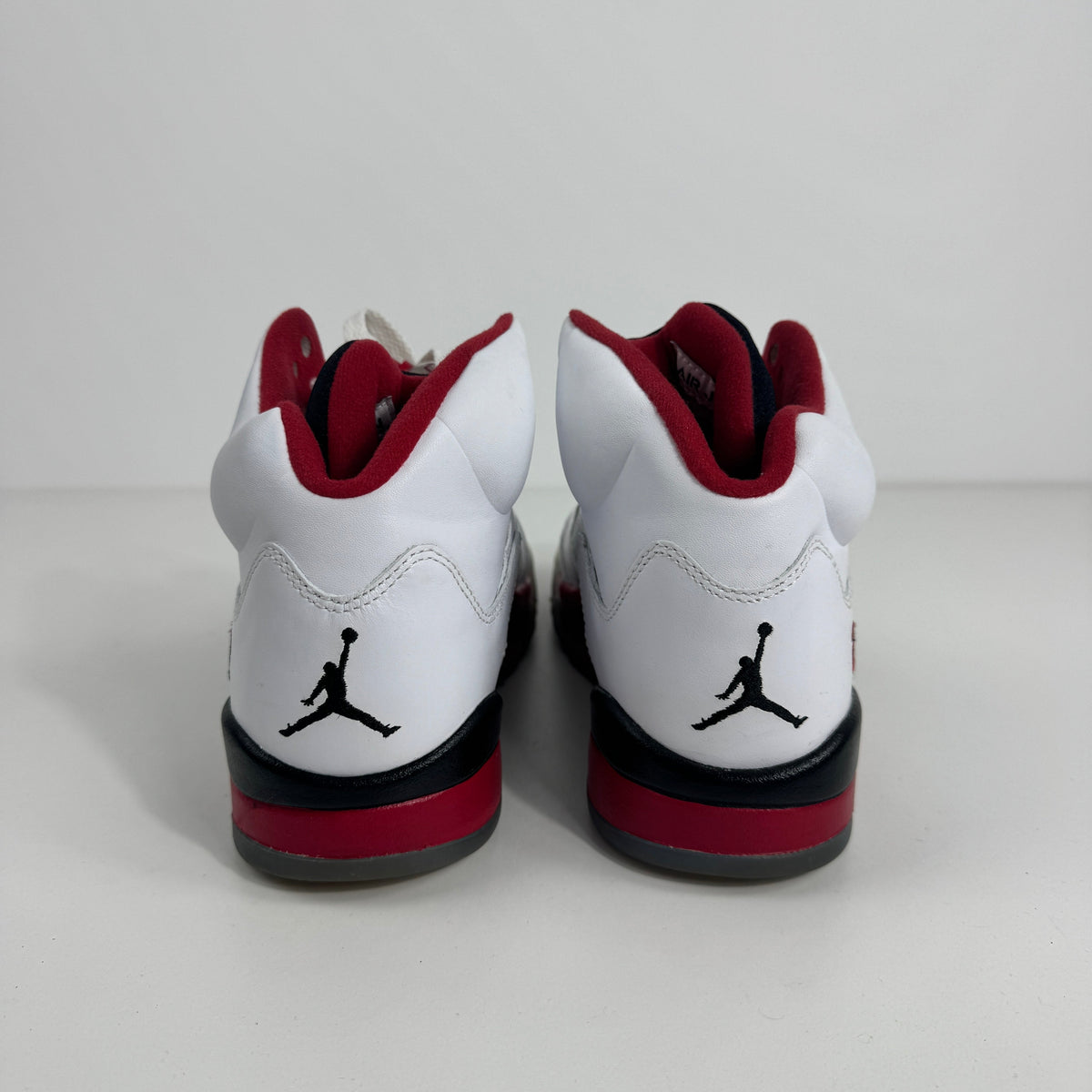 Air Jordan 5 Retro Fire Red is a classic basketball sneaker that brings back one of the most iconic colorways in the Jordan