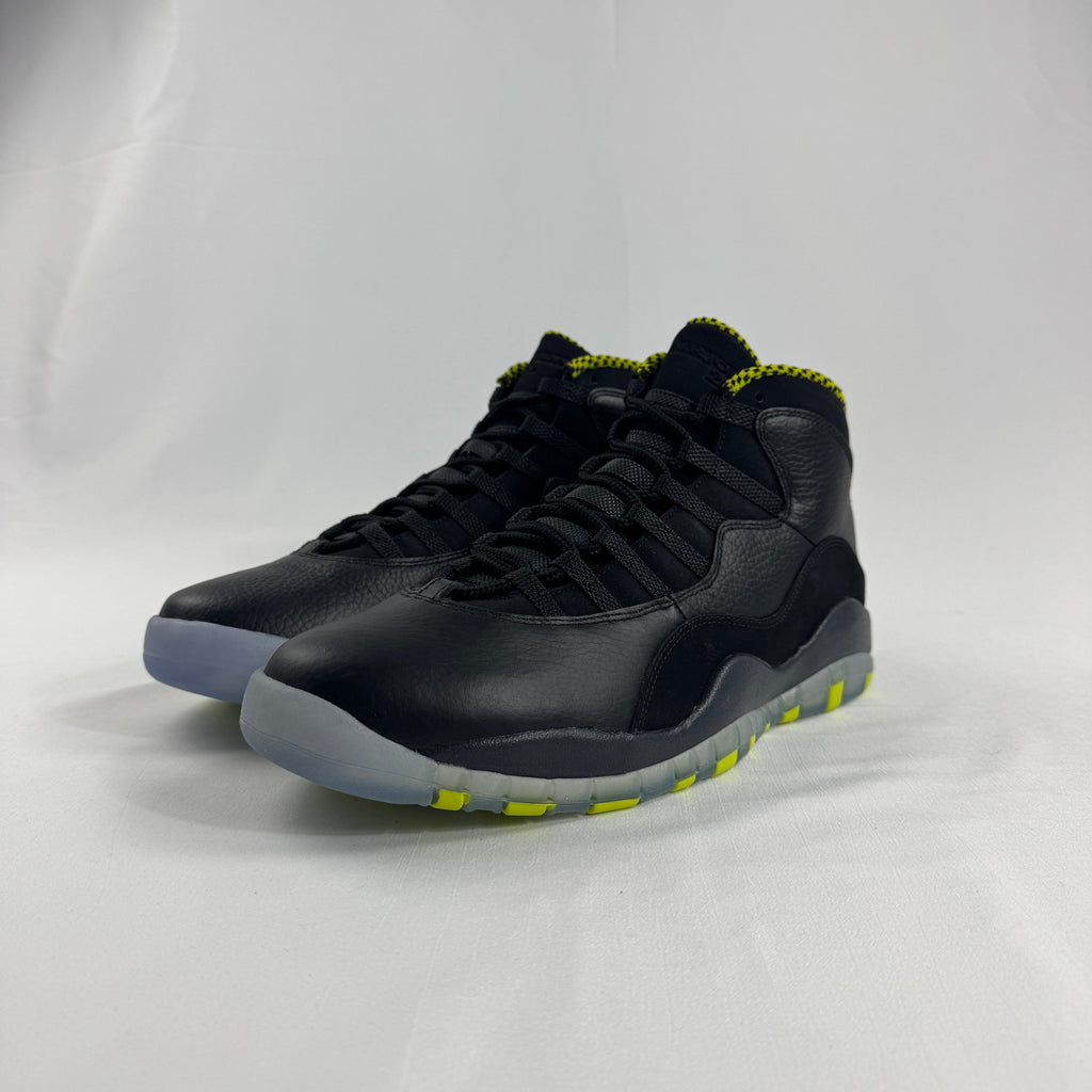 The Nike Air Jordan 10 Retro Black Venom features a sleek black tumbled leather upper paired with vibrant Venom Green