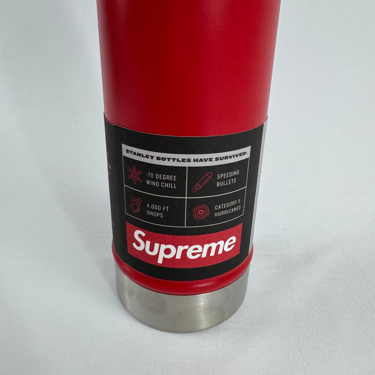 Supreme Classic Water Bottle in red, featuring bold Supreme branding on a compact 0.59L ( 20oz) bottle. A practical everyday