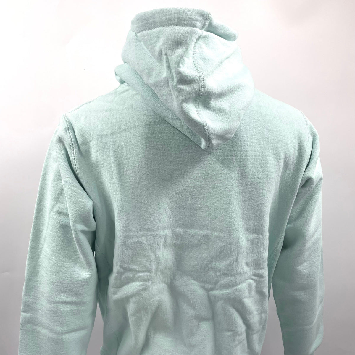 The Supreme Gold Box Logo Hoodie Ice Blue is a heavyweight cotton hoodie featuring the iconic Supreme Box Logo embroidered